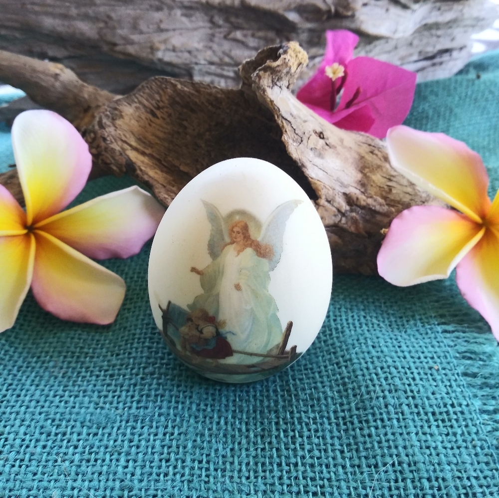 Vintage porcelein egg hand painted depicts angel watching over children